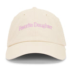Beige cap with 'Favorite Daughter' text on a white background