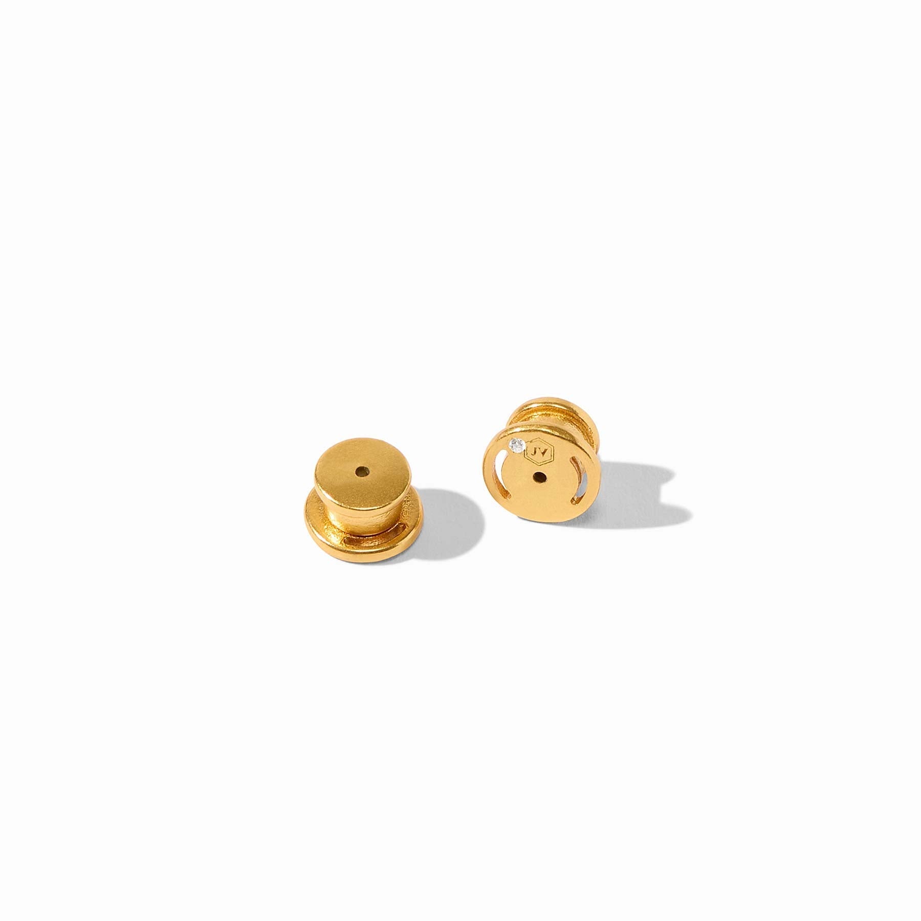 Gold earrings on a white background