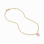 Gold chain necklace with a pink pendant on a white background