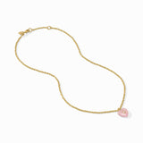 Gold chain necklace with a pink pendant on a white background