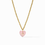 Necklace with a pink heart pendant and gold chain on a white background