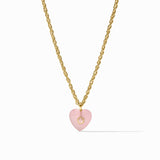 Necklace with a pink heart pendant and gold chain on a white background