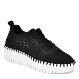 Black sneaker with white sole on a white background