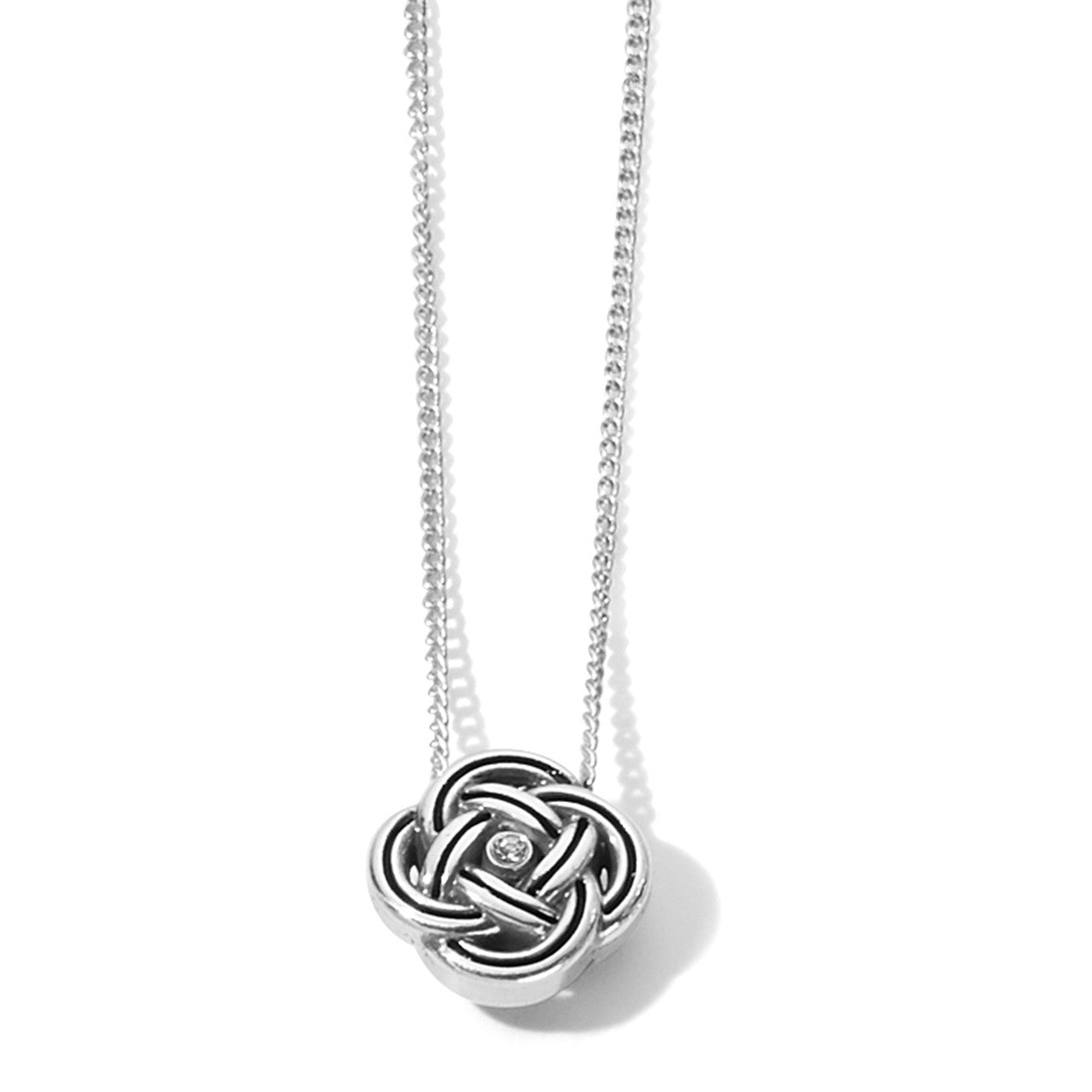 Silver knot pendant necklace on a white background
