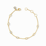 Gold bracelet with square gemstones on a white background