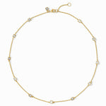 Gold necklace with small diamonds on a white background