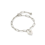 Silver chain bracelet with a heart padlock charm on a white background