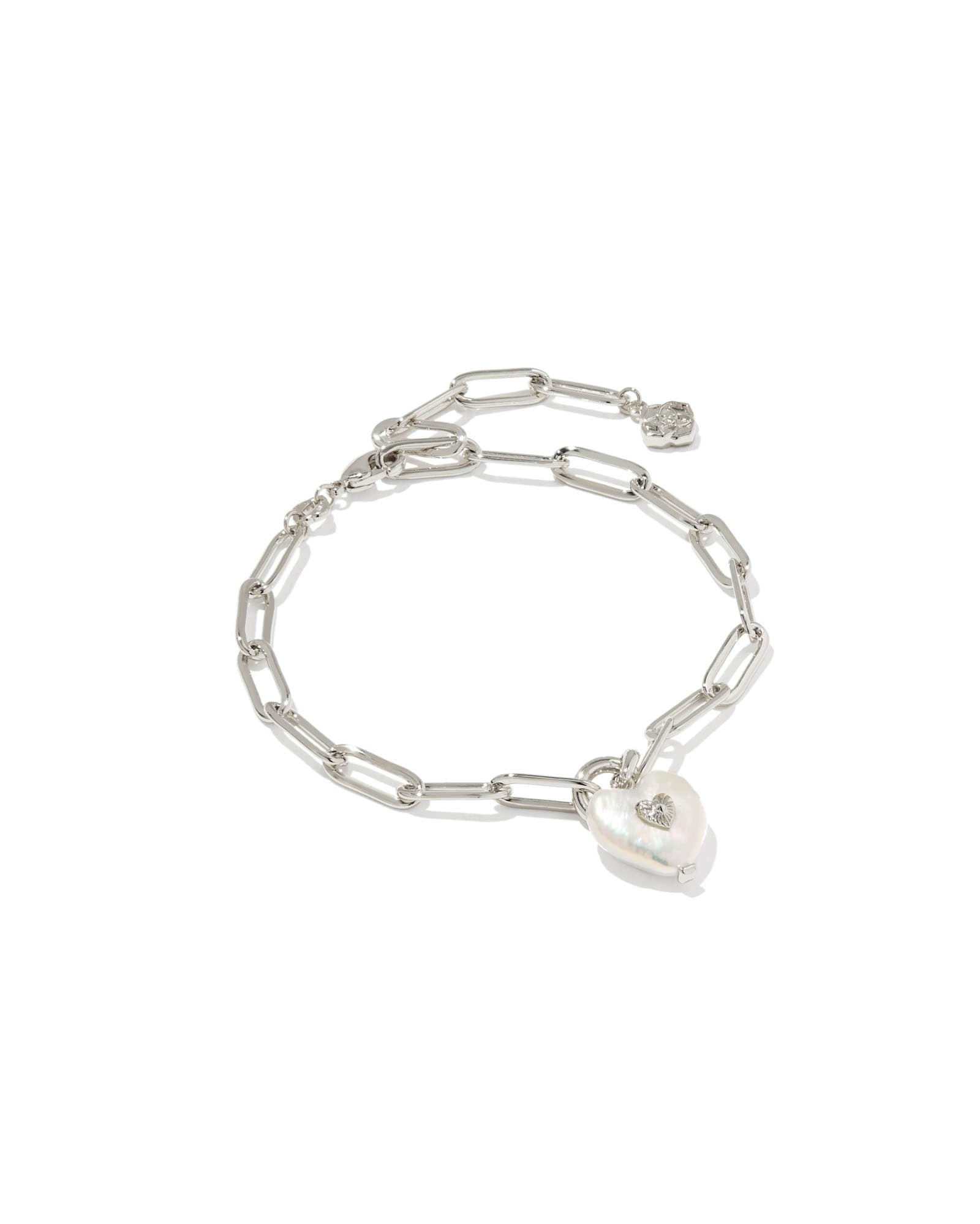 Silver chain bracelet with a heart padlock charm on a white background
