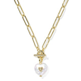 Gold chain necklace with a heart-shaped pearl pendant on a white background