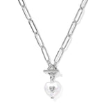 Silver necklace with a heart-shaped pendant on a white background