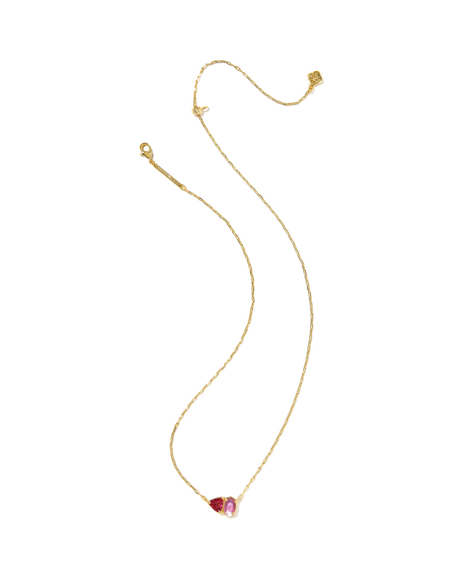 Gold necklace with a heart-shaped pendant on a white background