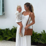 Hobo Kori Crossbody in warm honey leather with adjustable strap and zip closure