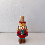 Decorative figurine of a nutcracker with a white background