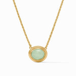 Gold necklace with a green pendant on a white background