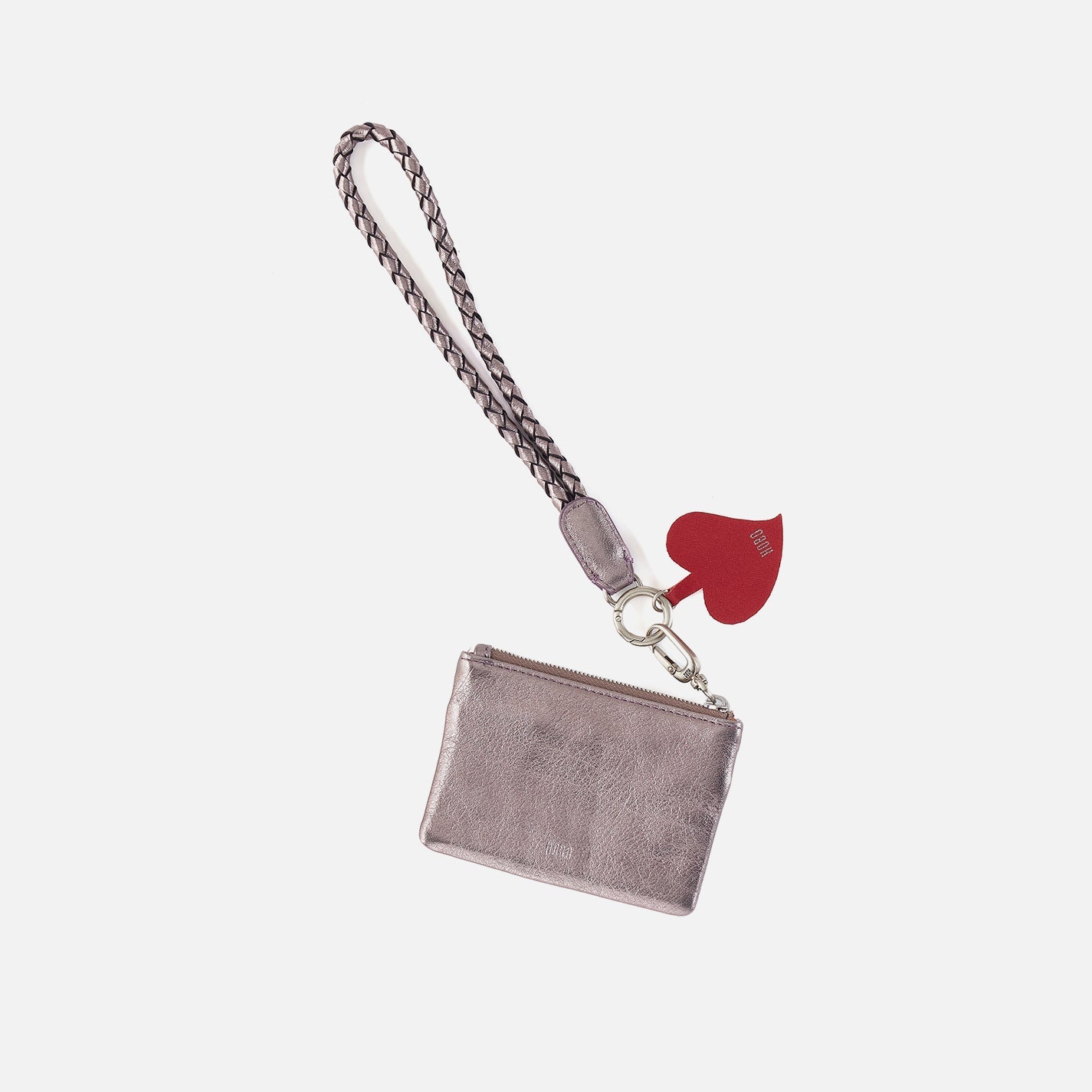 Hobo lasso phone wristlet in metallic leather, color pewter spur against a white background. 