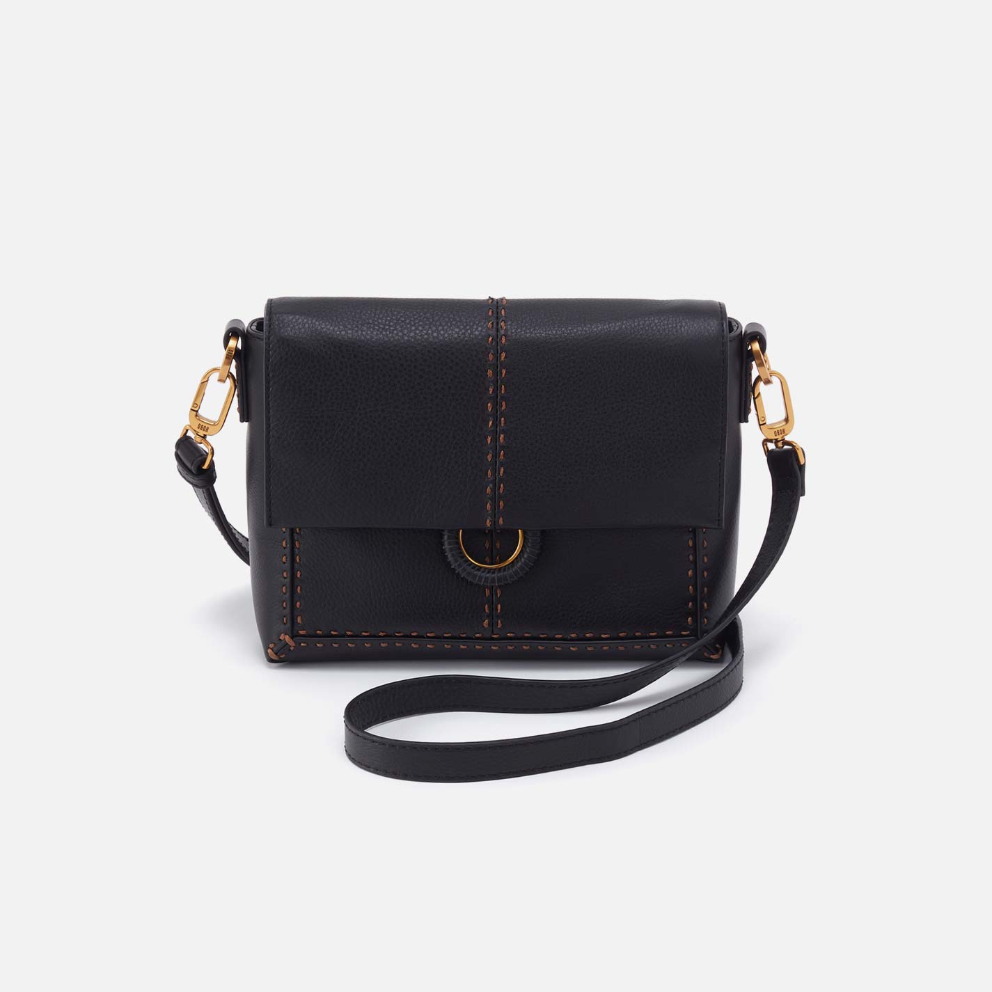 Black leather crossbody bag with gold accents on a white background