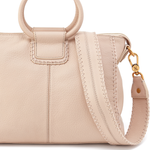 Beige handbag with a gold clasp on a white background