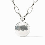 Silver necklace with a round pendant on a white background