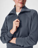 AIR ESSENTIALS HALF ZIP TOP