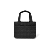 Black quilted handbag on a white background
