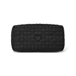 Black quilted clutch with a heart design on a white background