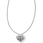 Heart-shaped pendant necklace on a white background