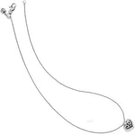 Silver necklace with a heart-shaped pendant on a white background