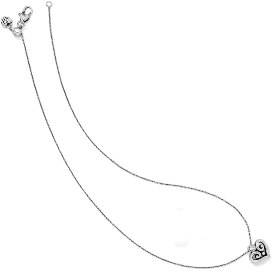 Silver necklace with a heart-shaped pendant on a white background