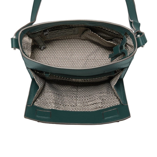 Green handbag with patterned interior on a white background