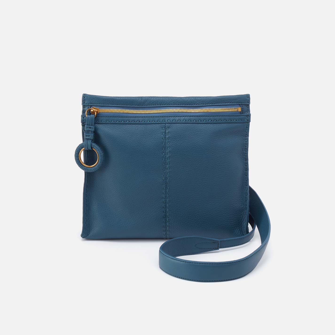Blue crossbody bag with a strap on a white background