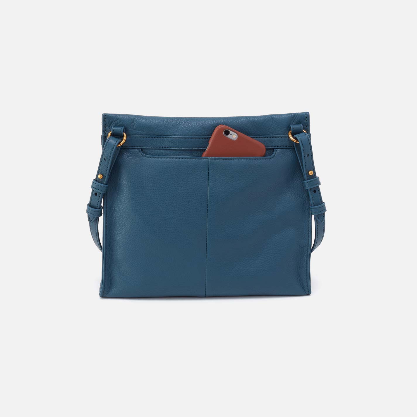 Blue handbag with a brown phone case on a white background