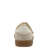 Beige shoe with a brown sole on a white background