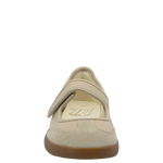 Beige shoe with a brown sole on a white background