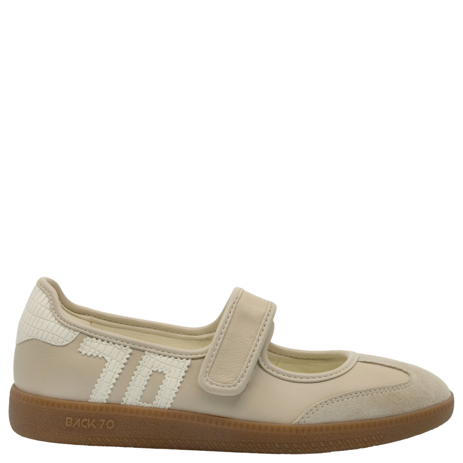 Beige shoe with a strap on a white background