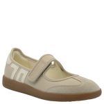 Beige children's shoe with a brown sole on a white background