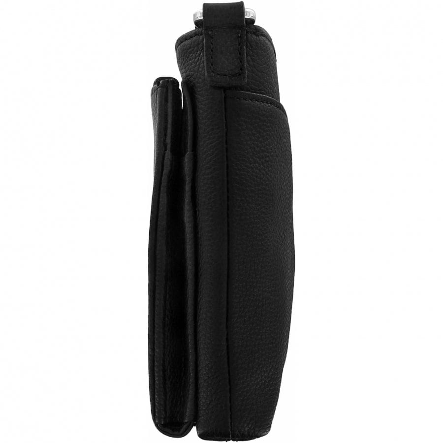 Black leather crossbody bag with a heart-shaped clasp and tassel on a white background