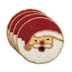 Set of four beaded Santa Claus coasters on a white background