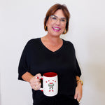 Woman holding a mug with a white background