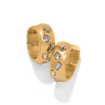 Gold hoop earrings with embedded crystals on a white background