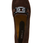 Brown suede loafer with a decorative buckle on a white background