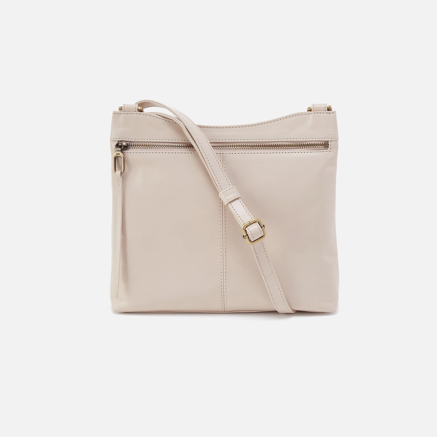 Beige crossbody bag on a white background