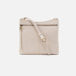Beige crossbody bag on a white background