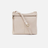 Beige crossbody bag on a white background
