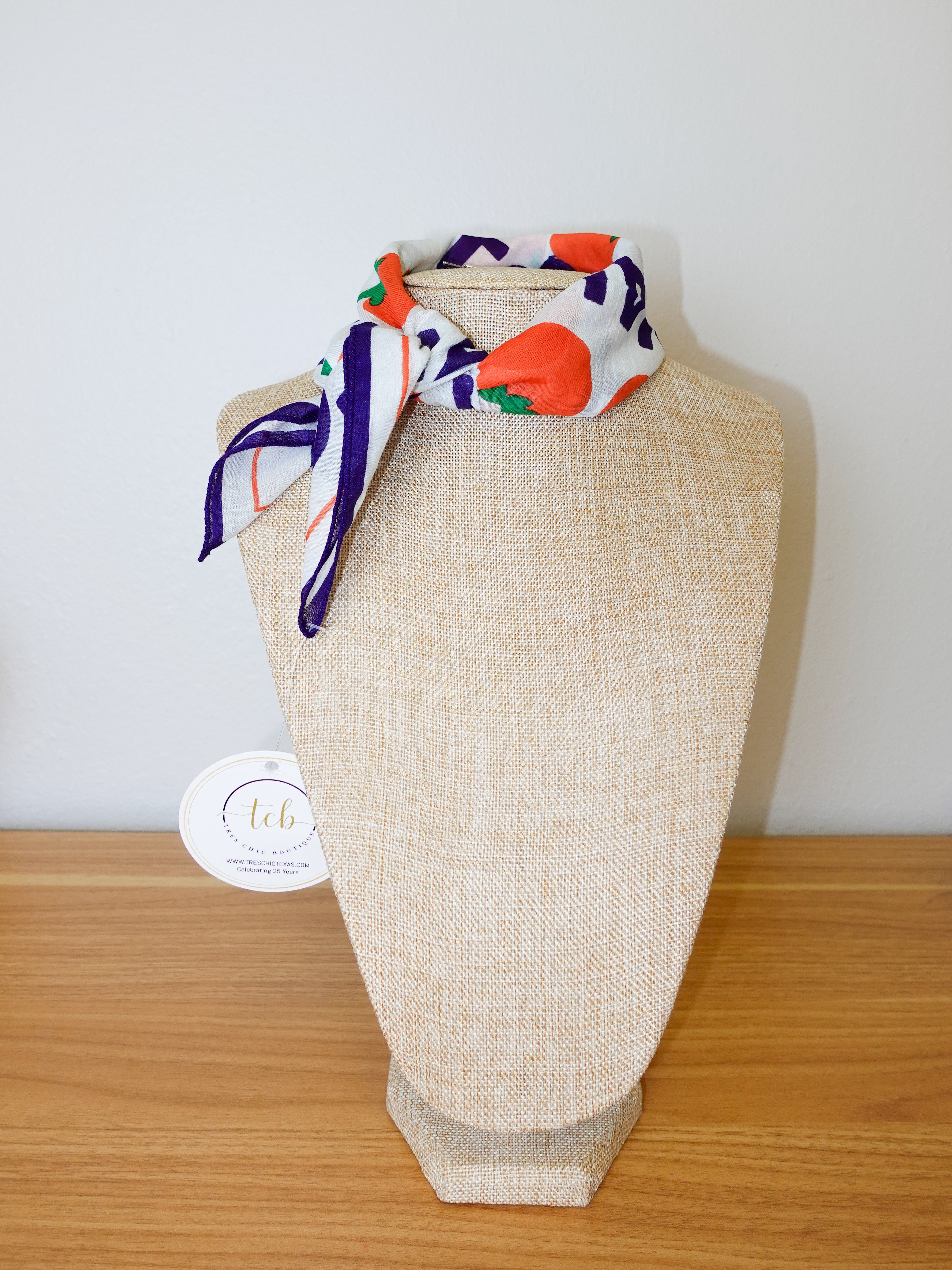 Colorful scarf on a mannequin bust with a white background