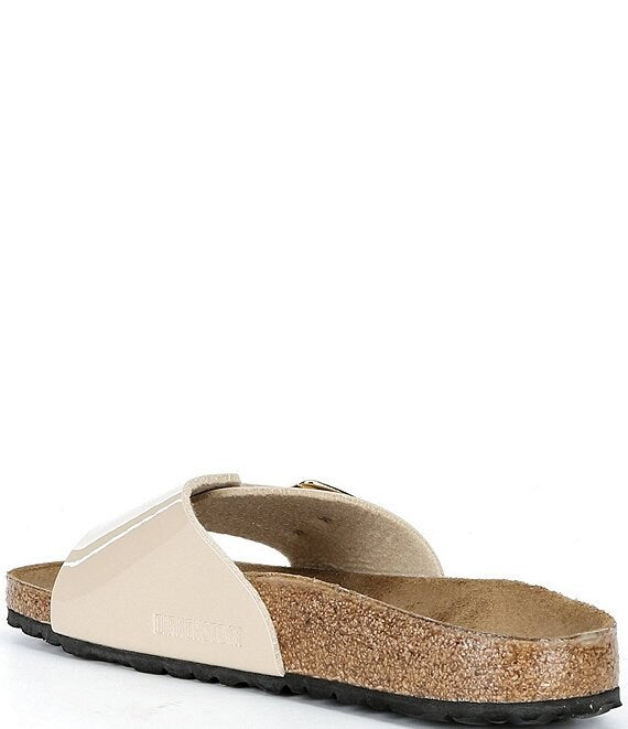 Beige sandal with cork sole on a white background