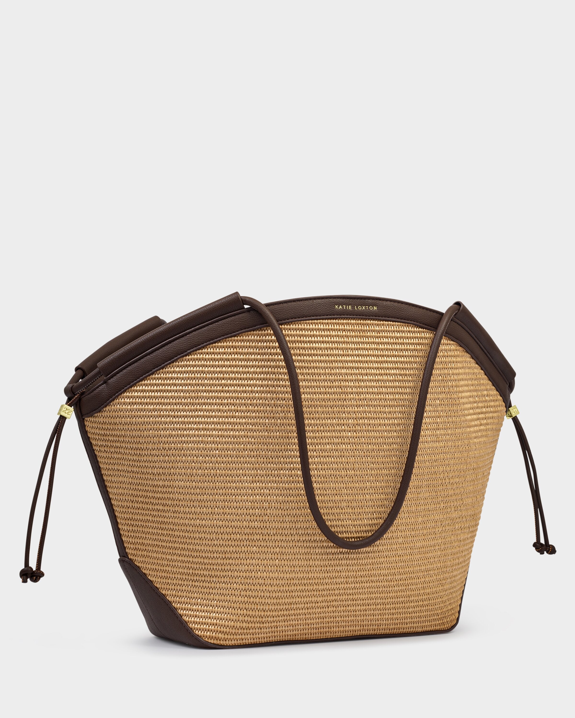 Beige handbag with brown accents on a light gray background
