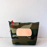 Camouflage pouch with a pink patch on a white background