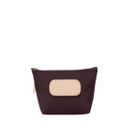 Small purple pouch with a beige patch on a white background