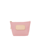 Pink pouch with beige patch and zipper on a white background