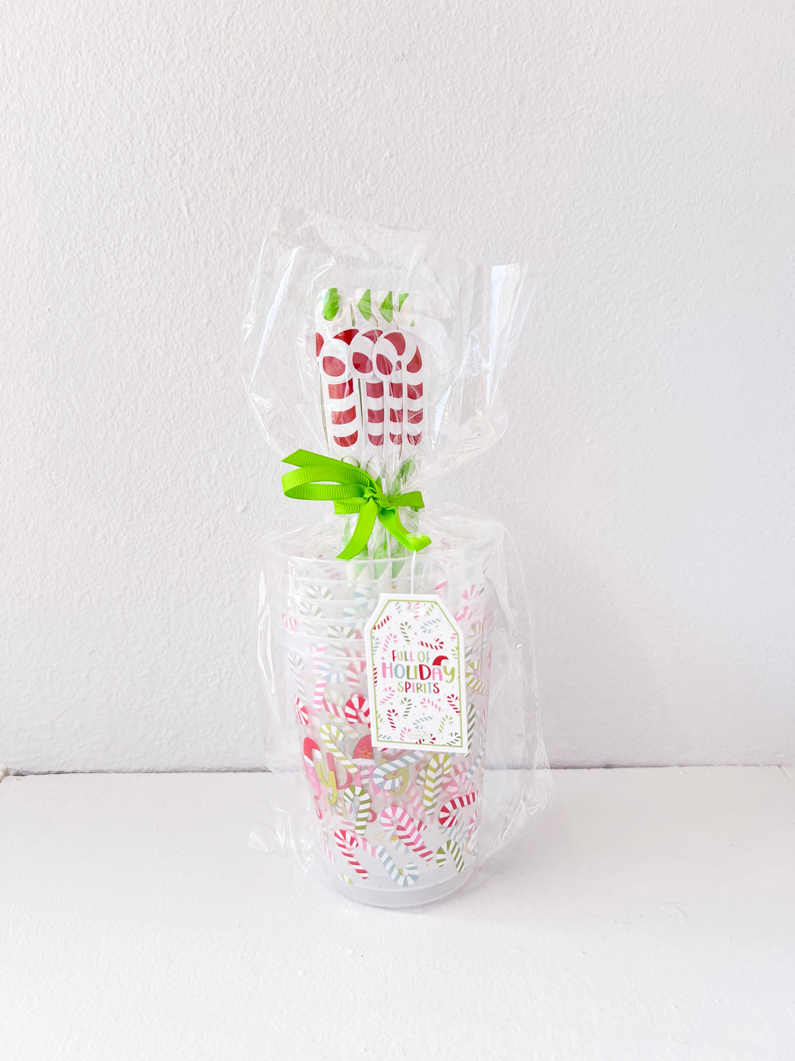 Clear plastic bag with floral design and greenery on a white background